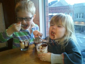 Kids eating ice cream sundaes in restaurant - www.picklesINK.com